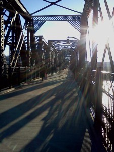 Bridge and shadows during cycling ride.